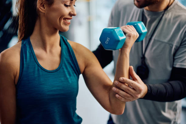 A person performing a dumbbell bicep curl with perfect form.